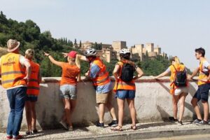 Albayzin and Sacromonte Electric Bike Tour in Granada - Paseo de los Tristes: Alhambra views and the Bridge of the Chirimias