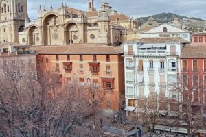Flavors of Granada Walking Tour - Plaza Nueva: wine tasting where the vibe is part of the drink