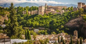 Granada: Alhambra and Charles V Palace Tour - Puerta de la Justicia: Where the Alhambra Story Starts