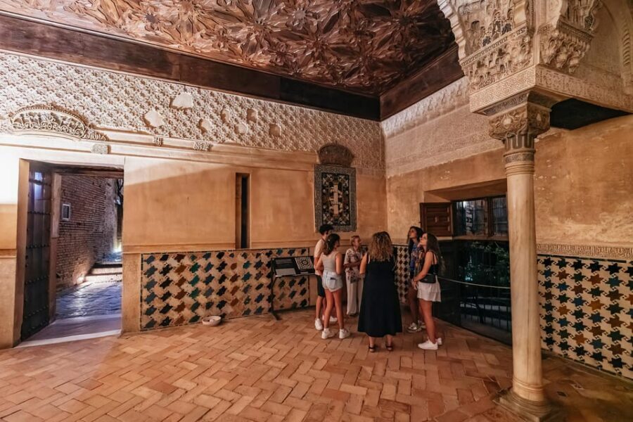 Granada: Alhambra and Nasrid Palaces Guided Tour at Night - Nasrid Palaces at night: courtyards, carved wood ceilings, and cool geometry
