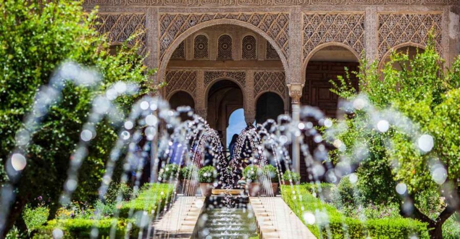 Granada: Alhambra Fast-Track Guided Tour - Charles V Palace: a short stop that explains Spain’s layers