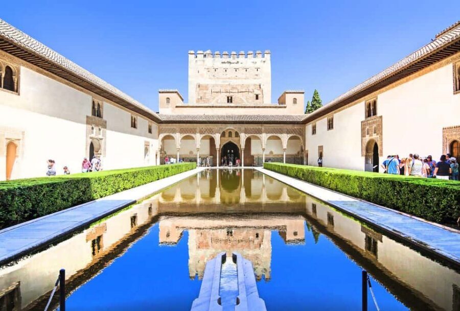 Granada: Alhambra Guided Tour with Nasrid Palaces & Gardens - Alcazaba Fortress and the climb to Torre de la Vela