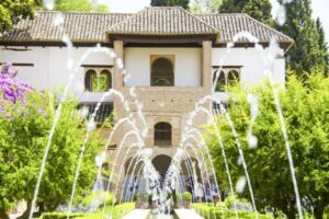 Granada: Alhambra, Nasrid, and Generalife Private Tour - Entering the Alhambra complex with skip-the-line tickets