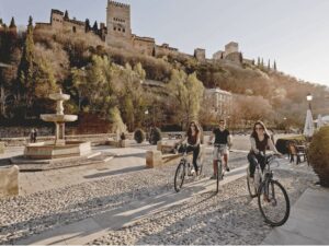 Granada: Electric Bike Tour of Albayzin and Sacromonte - Electric assist into Sacromonte: hills, caves, and Abadía del Sacromonte