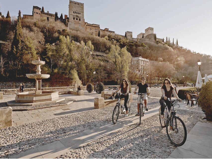 Granada: Electric Bike Tour of Albayzin and Sacromonte - Electric assist into Sacromonte: hills, caves, and Abadía del Sacromonte