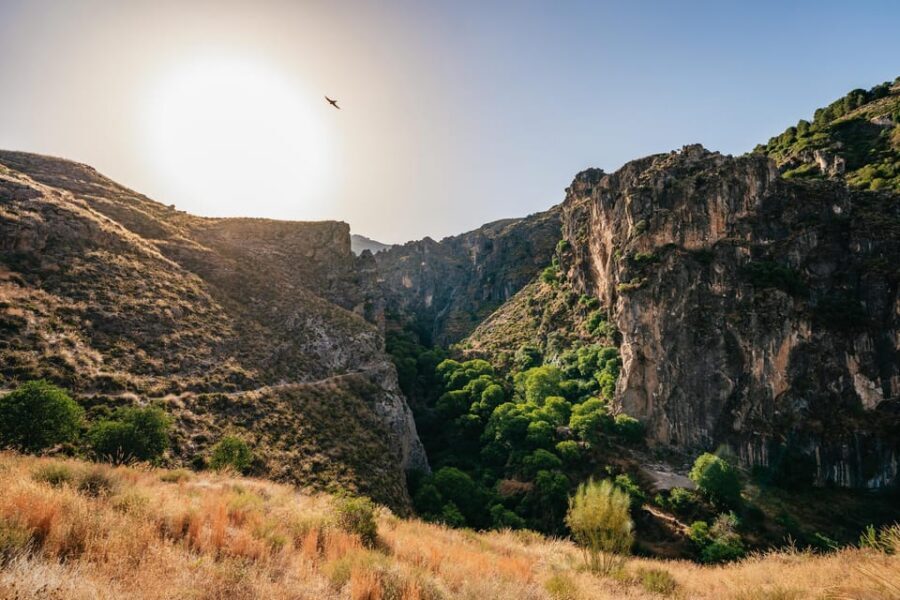 Granada: Los Cahorros de Monachil Canyon Hiking Tour - Into Los Cahorros: waterfalls, natural pools, and the narrow tunnel moment