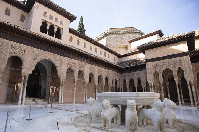 Guided Walking Tour of the Alhambra in Granada - Stop 1: The Alhambra walk—Nasrid city, patios, and water channels