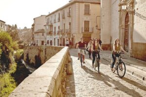 Private Electric Bike Tour with Play Granada - Getting started at Play Granada on Carrera del Darro