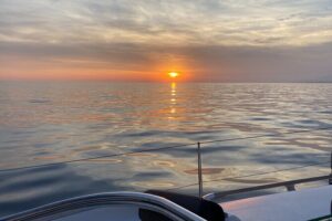 Sailing at sunset along the cliffs of Maro-Compartida - The Bavaria 37 cruiser: comfort on the water, not a party boat