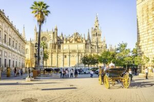 Seville Tour with Alcazar, Cathedral and Giralda from Granada - Entering Seville Cathedral and Getting Your Bearings Fast