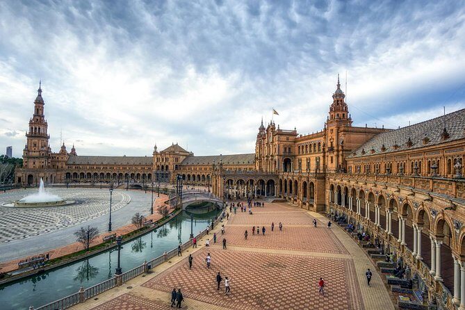 Seville Tour with Alcazar, Cathedral and Giralda from Granada - Real Alcázar: Where Moorish Design Feels Like It’s Still Moving